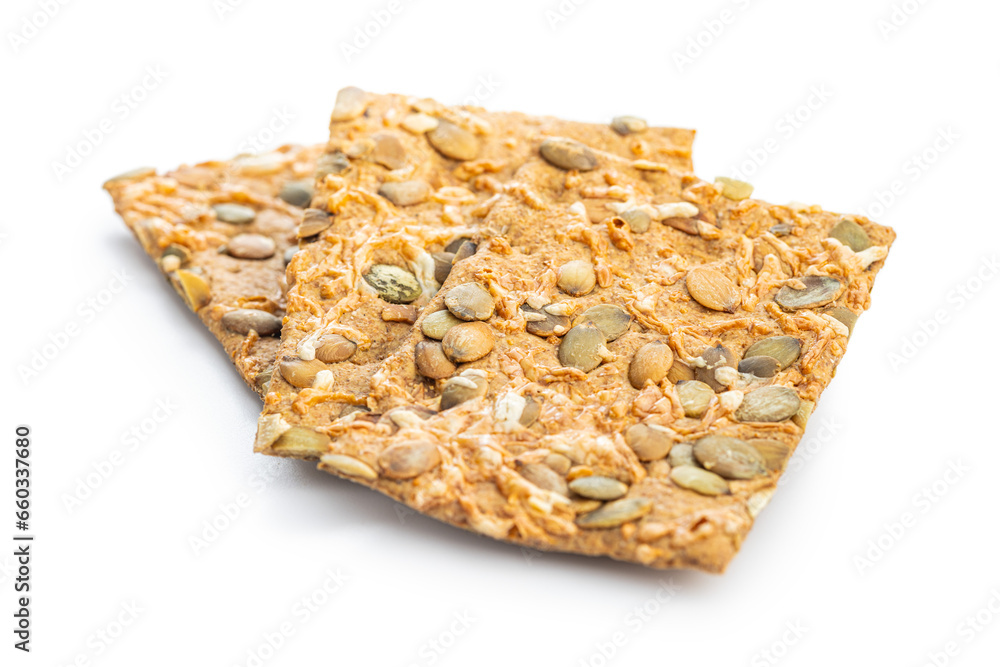 Knackebrot with pumpkin seeds. Wholegrain crispbread isolated on white background. Knackebrot with pumpkin seeds. Wholegrain crispbread isolated on white background.