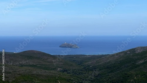 Giraglia island and lighthouse from Cap Corse viewpoint opf Rogliano in northern Corsica in France photo