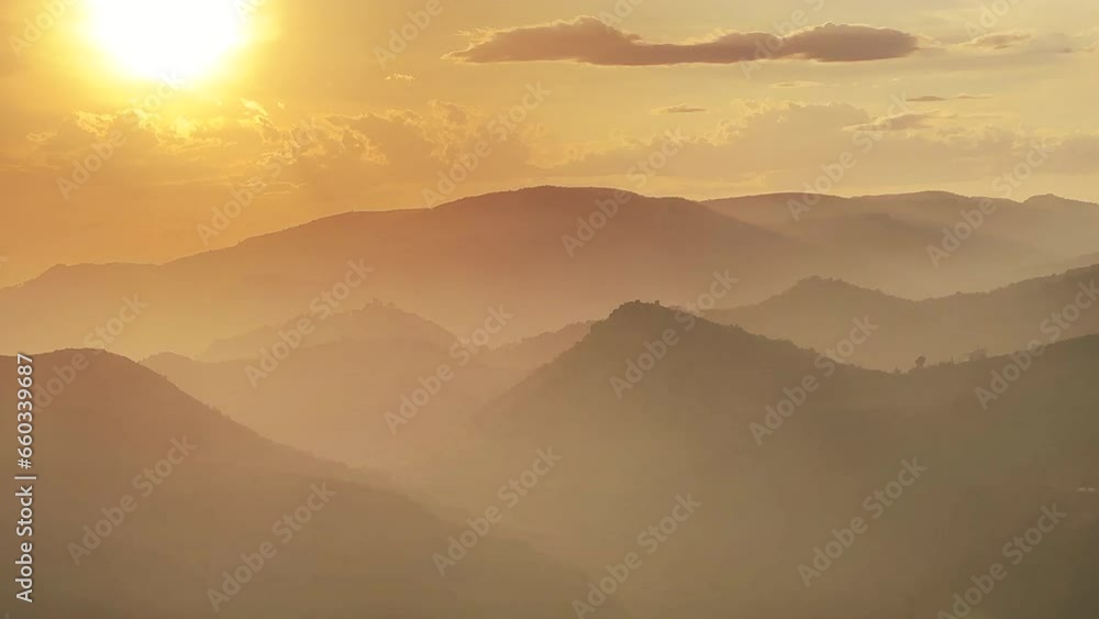 Mountains landscape on sunset. Mountain view from peak Mola De Segart mountain in Sierra Calderona national park. Sunset over Golden Hills mountains. Landscape of a mountain valley. Hiking in mountain Mountains landscape on sunset. Mountain view from peak Mola De Segart mountain in Sierra Calderona national park. Sunset over Golden Hills mountains. Landscape of a mountain valley. Hiking in mountain