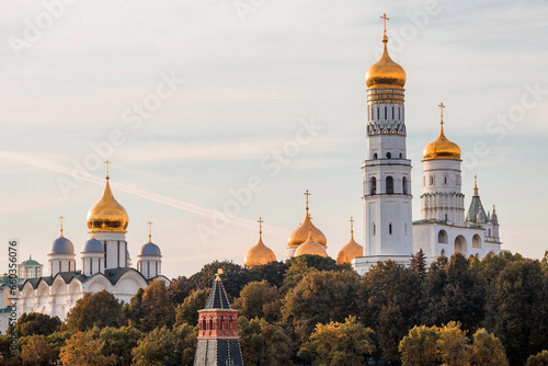 MOSCOW, RUSSIA - SEPTEMBER 26, 2023: View of Moscow on an autumn evening at sunset. Kremlin towers. The Grand Kremlin Palace, the Assumption and Annunciation Cathedrals. A popular tourist attraction.