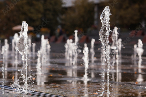 Abnormally hot autumn weather in the city. Water jets of the fountain in the Muzeon Park in Moscow. Russia, Moscow, September 2023 photo