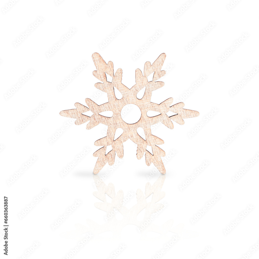 Front view of single wooden carved elegant snowflake isolated on white background is a symbol of christmas or new year celebration used as traditional decorative element at winter holiday vacation Front view of single wooden carved elegant snowflake isolated on white background is a symbol of christmas or new year celebration used as traditional decorative element at winter holiday vacation
