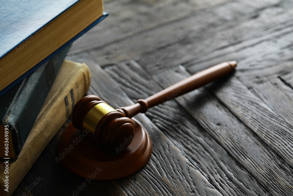 Obraz premium Judges gavel on wooden desk. Law firm concept.