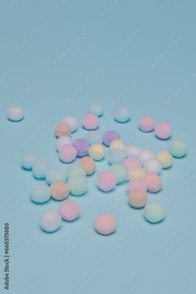 colorful pastel balls on a blue background