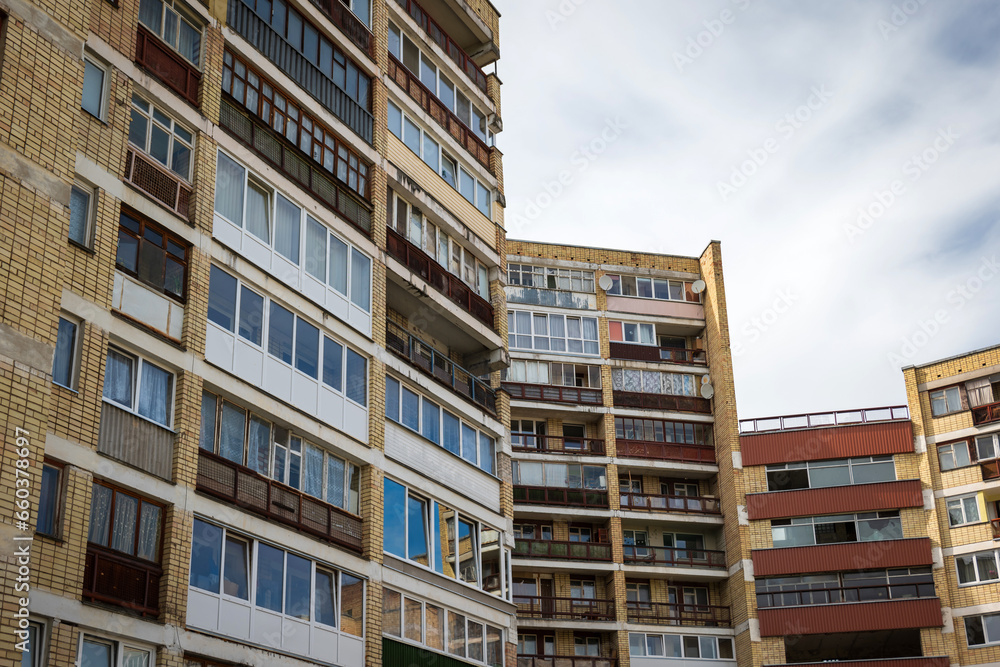Bright brick apartments building with flat windows in visaginas lithuania Bright brick apartments building with flat windows in visaginas lithuania