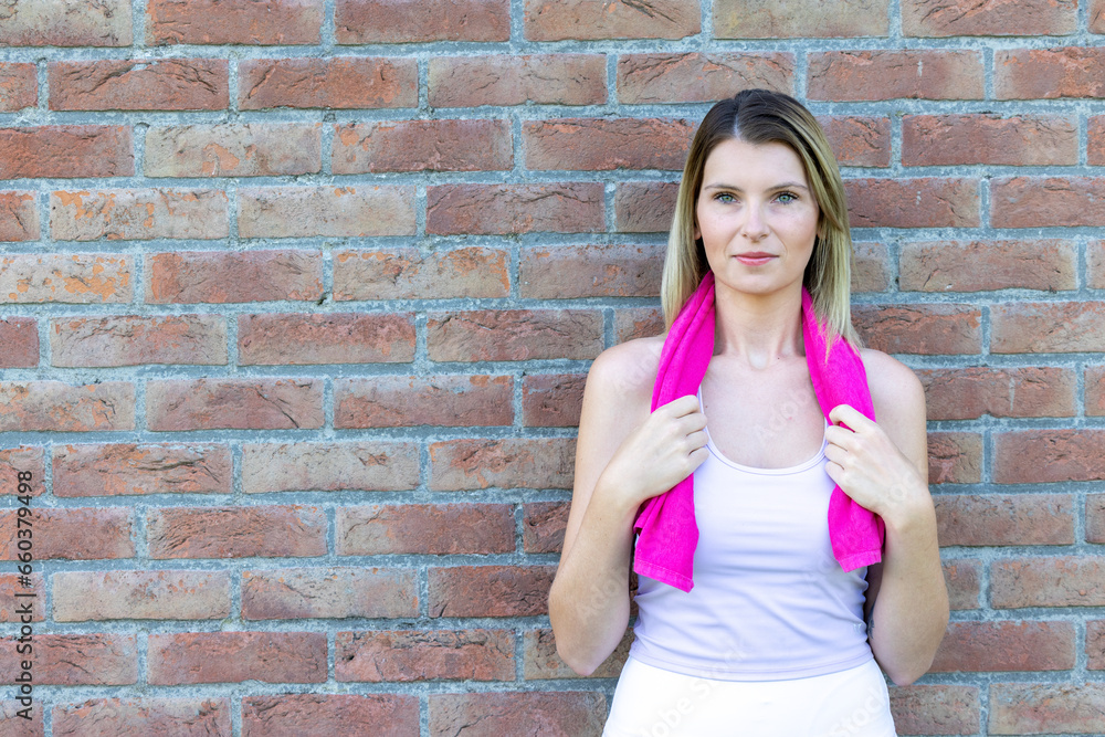 Capture the essence of wellness and vitality in this empowering footage. A beaming fitness woman, clad in a top and leggings, takes a well-deserved break after her invigorating training session. She Capture the essence of wellness and vitality in this empowering footage. A beaming fitness woman, clad in a top and leggings, takes a well-deserved break after her invigorating training session. She
