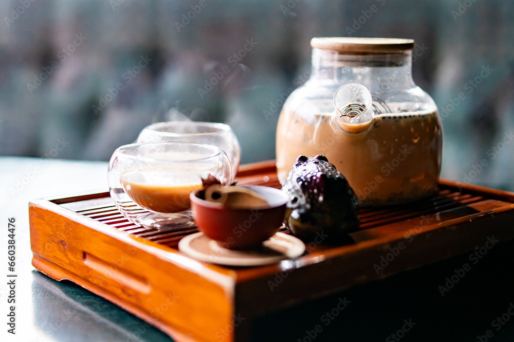 tea pot and Cup of masala tea tea pot and Cup of masala tea
