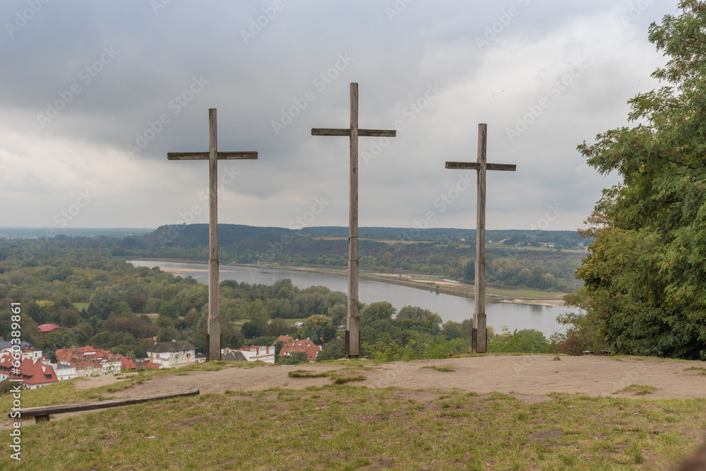 Hill of Three Crosses commemorating victims of the plagues that swept through Kazimierz Dolny in the 18th century. The town and River Vistula visible below, Kazimierz Dolny, Poland Hill of Three Crosses commemorating victims of the plagues that swept through Kazimierz Dolny in the 18th century. The town and River Vistula visible below, Kazimierz Dolny, Poland