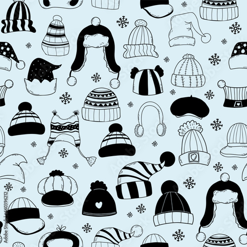 Seamless pattern with clothes and accessories. winter scarves and hats, socks and gloves on light blue background. Vector Illustration. hand drawn for wallpaper, design, textile, packaging