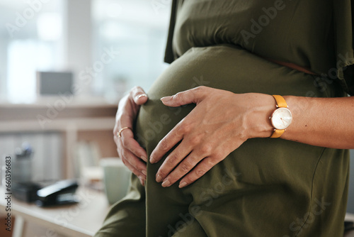 Worker, office and pregnant with hands, stomach and relax for break, company and workplace. Woman, employee or pregnancy in career, work or job with love, affection or care for baby, closeup or belly