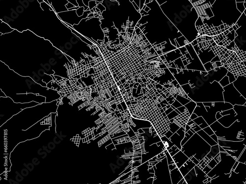 Vector road map of the city of  Comitan in Mexico with white roads on a black background. photo