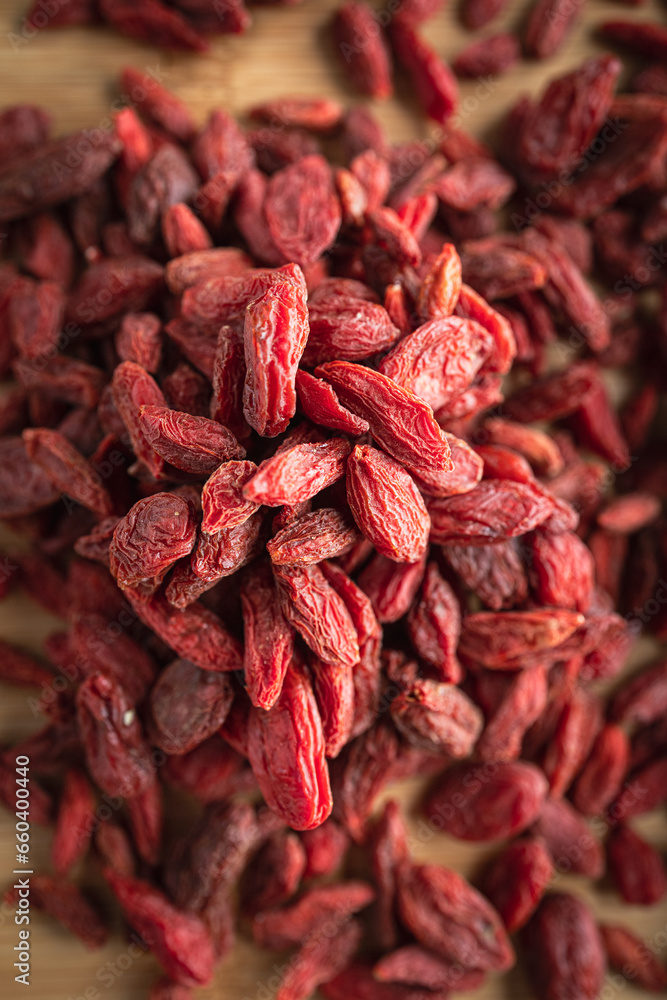 Goji berries on a wooden background Goji berries on a wooden background