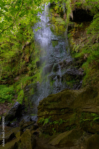Mallyan Spout waterfall becomes a blur as it tumbles 70 feet down a cliff face towards the River Esk.