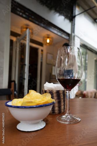  Spanish appetizer, glass of wine with patats