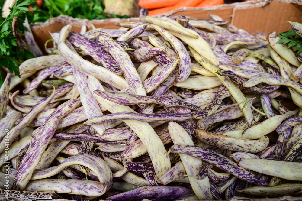 Bean pods for sale in market. Dragon tongue bean. Bean pods for sale in market. Dragon tongue bean.