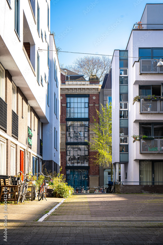 AMSTERDAM, NETHERLANDS - march 29, 2022: Modern architecture on the street in Amsterdam, Netherlands
