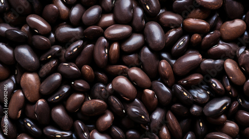 A detailed close-up of a heap of black or dark brown beans.Generative AI