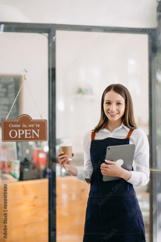 Startup successful small business owner sme woman stand with tablet in cafe restaurant. . Startup successful small business owner sme woman stand with tablet in cafe restaurant. .
