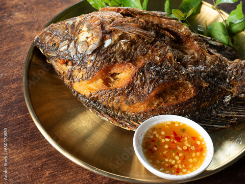 deep fried tilapia fish with dipping sauce
