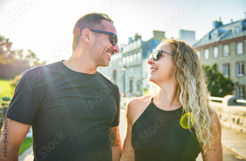 Beautiful couple having fun outdoors on urban background