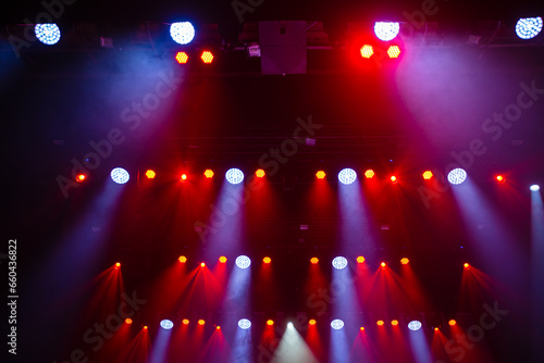Fotografie Colorful concert lights on empty stage