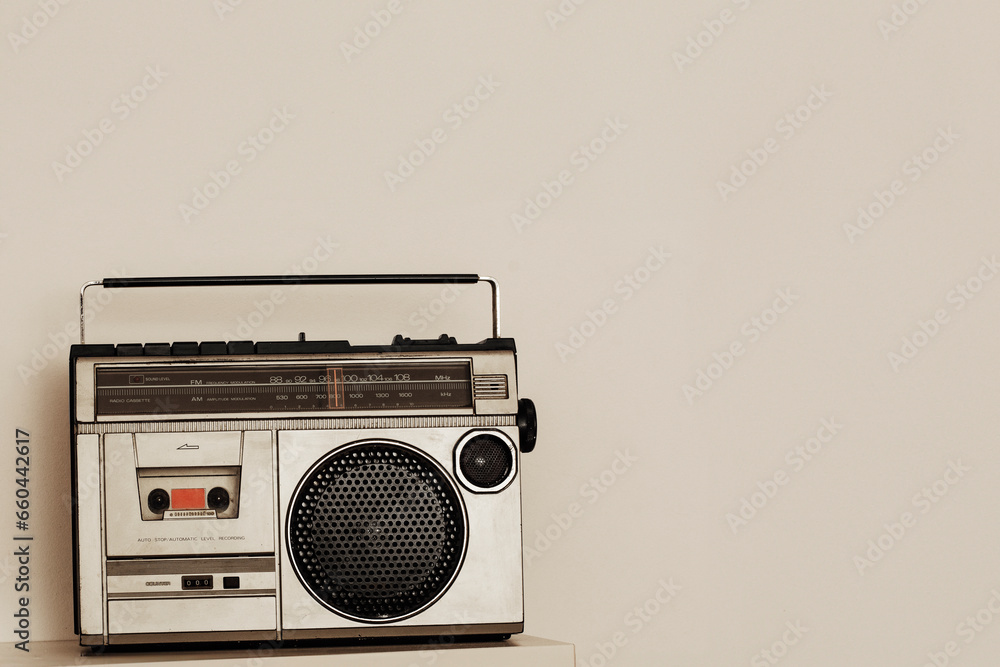 Old radio cassette background. Eighties music on portable radio. Image for music poster design