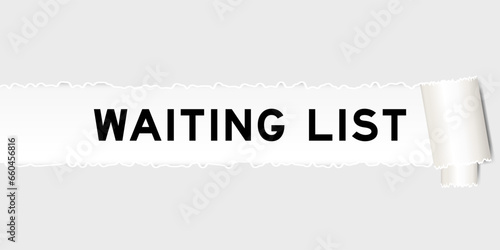 Ripped gray paper background that have word waiting list under torn part