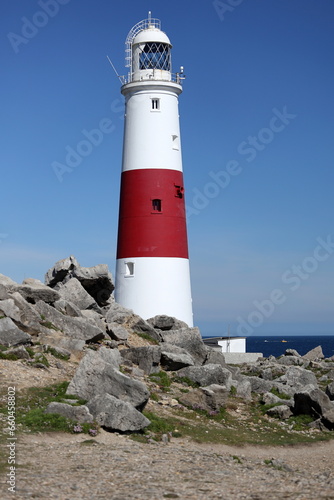 Vertical photo of the lighthouse at Portland Bill near Weymouth on the Jurassic Coast in Dorset, England.