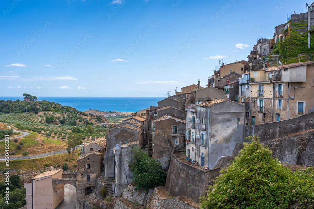 Hillside town in Badalato Italy with the sea in the background on a clear day