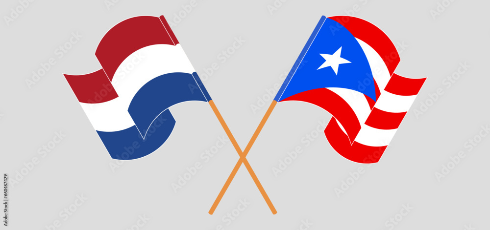 Crossed and waving flags of the Netherlands and Puerto Rico Crossed and waving flags of the Netherlands and Puerto Rico