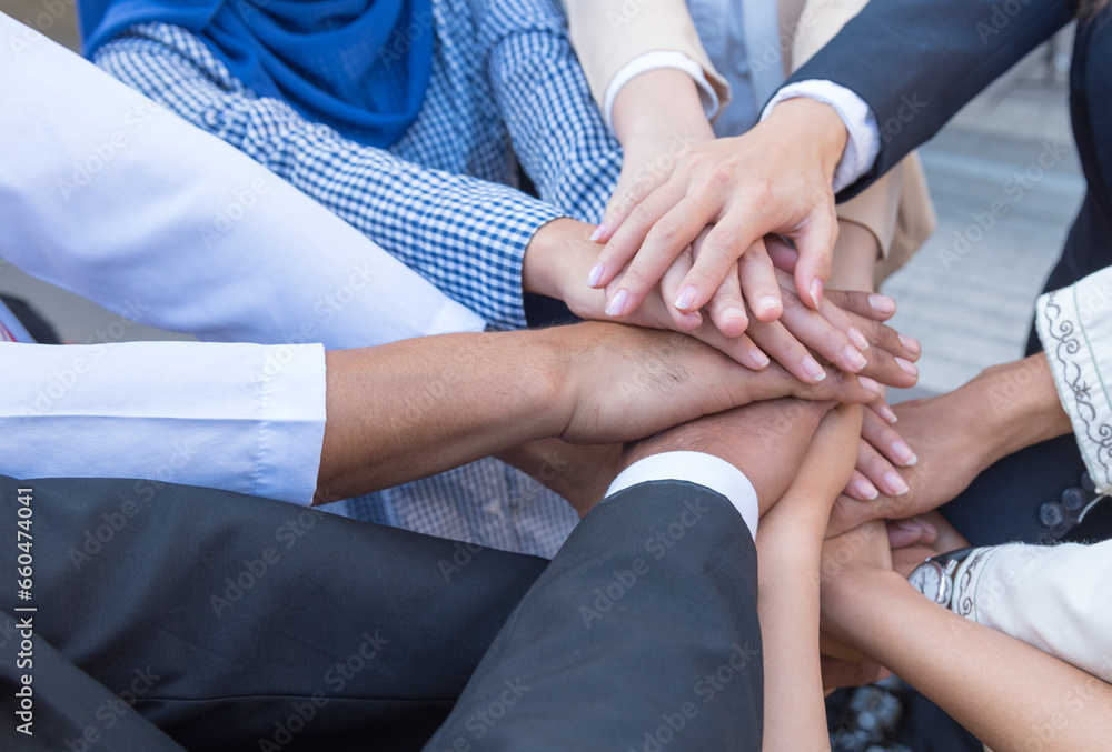 Persian and Arab business people join hands oneness. Unity and teamwork show by Stack mix of hands with Spirit diversity solidarity teamwork empower partnership trust.