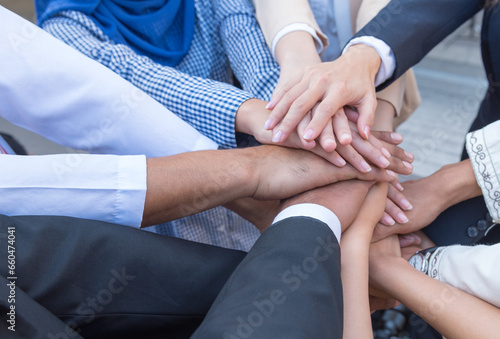 Persian and Arab business people join hands oneness. Unity and teamwork show by Stack mix of hands with Spirit diversity solidarity teamwork empower partnership trust.
