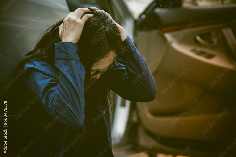 Robber threatened driver car on street. Thief use gun to intimidate asian woman for give car key