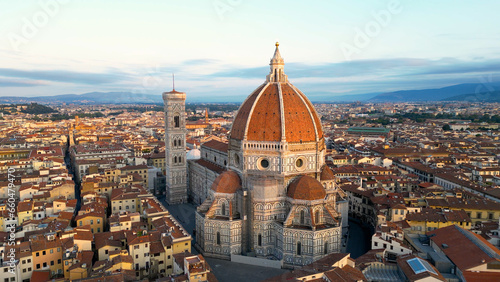 Aerial view of Florence Cathedral (Duomo di Firenze), Cathedral of Saint Mary of the Flower, sunset golden hour, Italy photo