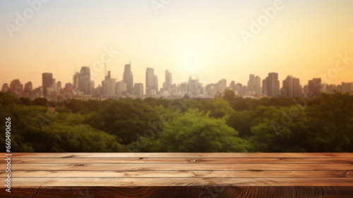 Empty wooden table top with blur background of city and park