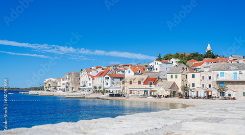 Obraz na płótnie View of Primosten, Croatia. Dalmatian coast. Summer view of Primosten town. w salonie