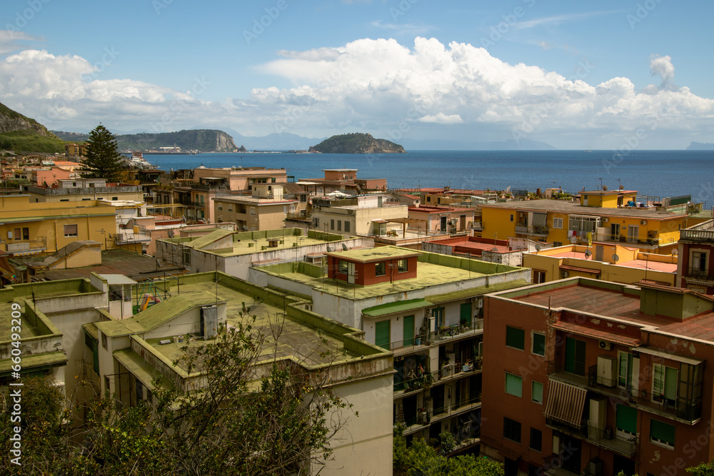 Fototapeta premium Bagnoli popular coastal tourist district of the city of Naples near Fuorigrotta and Pozzuoli. Bagnoli is part of the Campi Flegrei for its volcanic nature due to Vesuvius with frequent earthquakes 