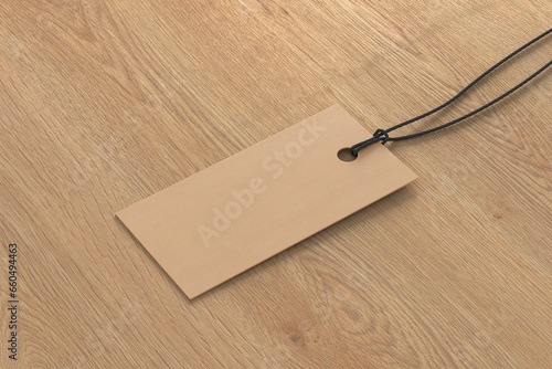 Cardboard rectangular tag mockup on wooden background. Side view