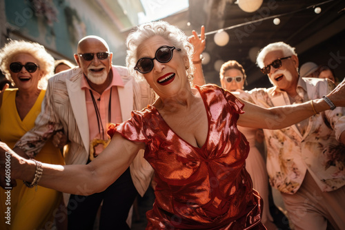 Happy mature senior people on city holiday dancing, having fun and enjoying life on festival, displaying joy, embodying a healthy, retired lifestyle