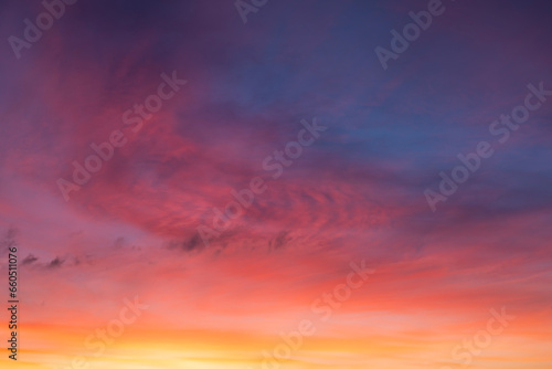 Fototapeta Naklejka Na Ścianę i Meble -  Glowing real sky at sunset texture background overlay. Dramatic red and orange clouds.