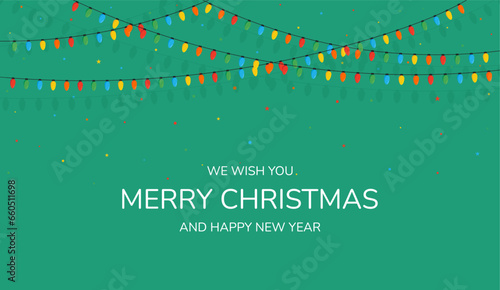 Christmas cards. Christmas color lights bulbs on a green background