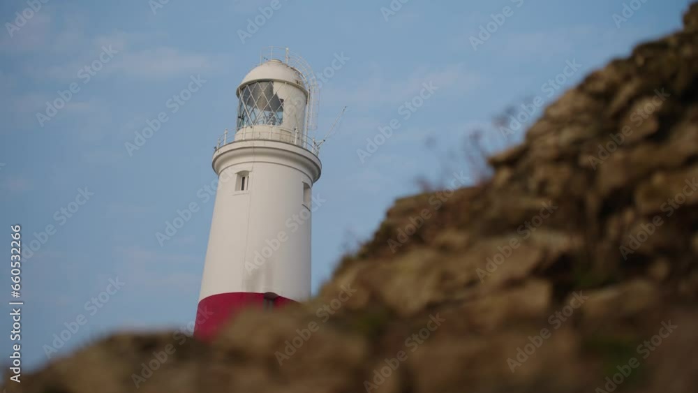 Lighthouse, UK with cliffs in foreground Lighthouse, UK with cliffs in foreground