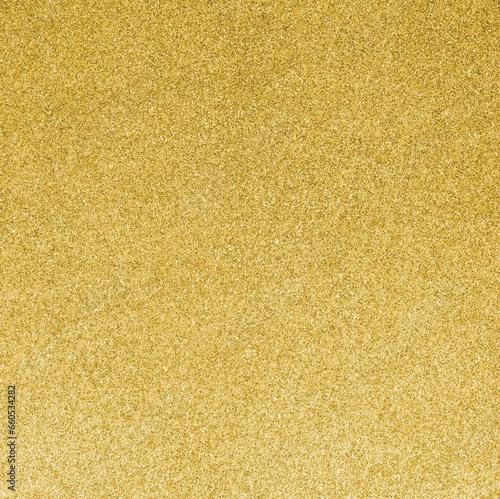 GOLDEN GLITTER sparkling background with bright reflections and many small lights