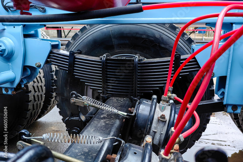 Container trailer frame and chassis, leaf springs, suspension system and pneumatic brake line.