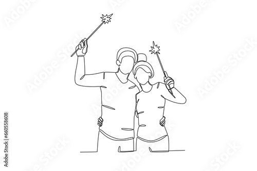 A couple playing the fireworks. New years eve one-line drawing