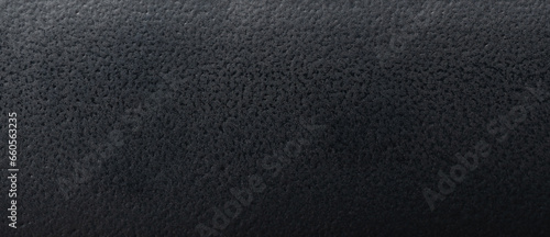 Rough black plastic texture background