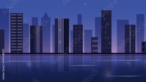 Night city view. Megapolis city landscape on the river bank with skyscrapers and high-rise buildings. City in dark blue and purple hues.
