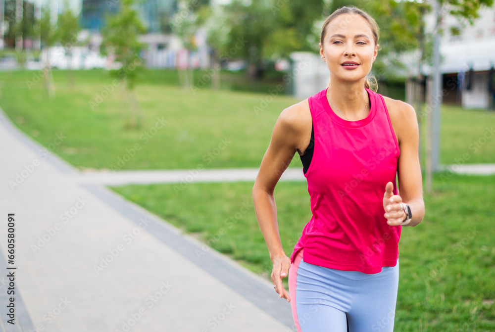 Beautiful woman running in an urban setting Beautiful woman running in an urban setting