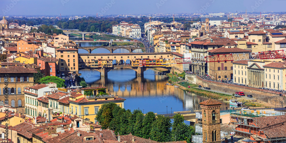 Italy, great landmarks and towns - city of art and culture-  Florence, panoramic view of city center and old bridge Ponte vechio