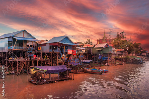 Landscape with floating village on the water of Tonle Sap lake, Cambodia